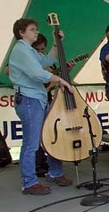 Beth White on mandolin-bass her mother built.